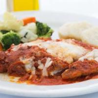 Parmigiana · Fresh mozzarella and tomato sauce.