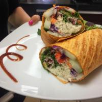 Chicken Salad Wrap · Chicken salad, mixed greens, tomatoes, cucumbers, carrots, red cabbage and bell pepper.