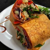 Turkey Burger Wrap · Homemade turkey burger with mixed greens, tomatoes, cucumbers, carrots, red cabbage and bell...