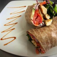 Tzatziki Chicken Wrap · Grilled chicken breast with tzatziki sauce, mixed greens, tomatoes, carrots, cucumbers, red ...