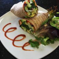 Avocado Star Wrap · Avocado, mixed greens, tomatoes, cucumbers, red cabbage, carrots, bell pepper and light hous...