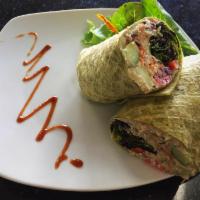 Hummus Wrap · Homemade hummus, mixed greens, tomatoes, cucumbers, red cabbage, carrots and bell pepper.
