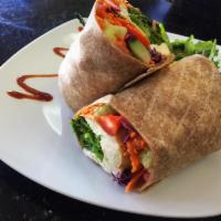 Tofu Wrap · Grilled organic tofu, mixed greens, tomatoes, cucumbers, carrots, red cabbage and bell peppe...