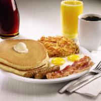 Grand Slam Slugger® · Buttermilk pancakes, eggs, bacon strips and sausage links. Served with potatoes or choice of...