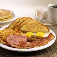 Lumberjack Slam® · Buttermilk pancakes, grilled ham, bacon strips, sausage links, eggs, hash browns and bread.