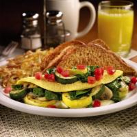 Loaded Veggie Omelette  · Three-egg omelette with fresh spinach, sautéed mushrooms, fire-roasted bell peppers & onions...