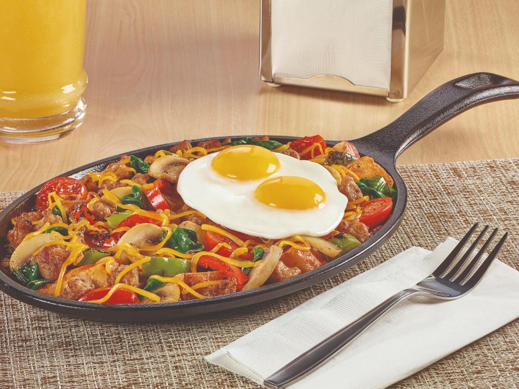 Supreme Skillet  · Sausage, fresh spinach, fire‑roasted bell peppers & onions, mushrooms, grape tomatoes, and seasoned red‑skinned potatoes. Topped with Cheddar cheese and eggs. Gluten-Free.