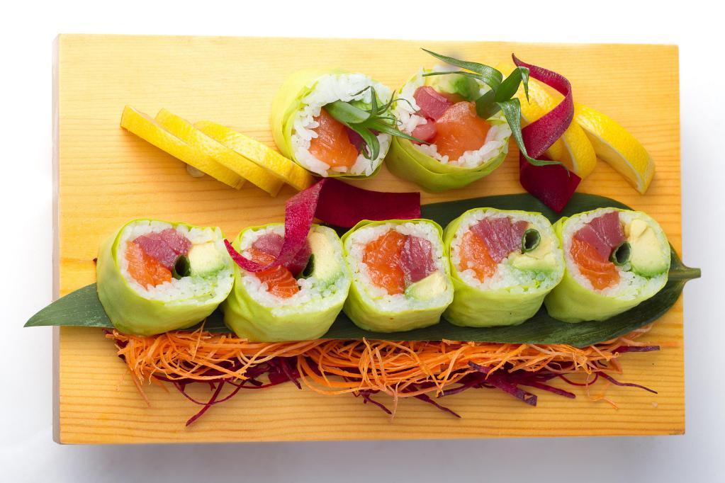 Bellagio Roll · Tuna, salmon, avocado and scallions wrapped with soybean paper topped with honey wasabi sauce.