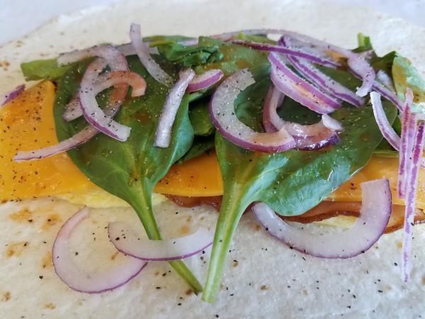 Breakfast Wrap · Wrap with egg & bacon, choice of cheese, choice of veggies