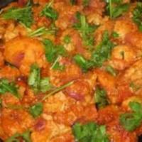 29. Aloo Gobhi Masal · Cubes of potatoes and fresh spinach cooked in delicious homemade sauce. Vegetarian.