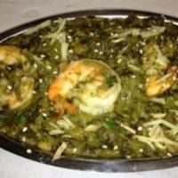Shrimp Saag · Shrimp cooked with spinach, onions, garlic, ginger, cream and spices. Served with rice.