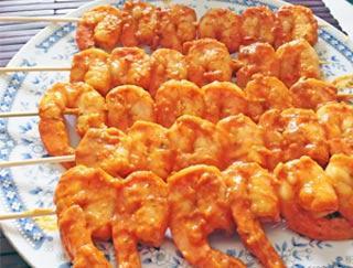 Shrimp Tikka Masala · Jumbo shrimp marinated delicately, roasted and folded into a rich creamy sauce. Served with rice.
