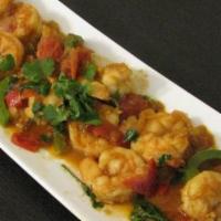 Shrimp Bhuna Special  · Jumbo size shrimp cooked slightly with a combination of fresh tomato, onion and spices. Serv...