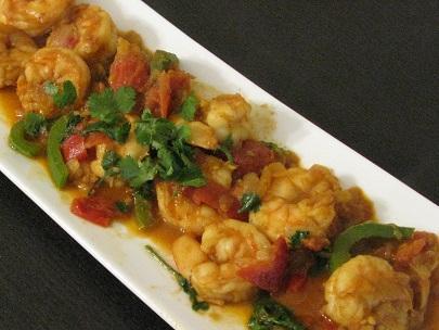 Shrimp Bhuna Special · Jumbo size shrimp cooked slightly with a combination of fresh tomato, onion and spices. Served with rice.