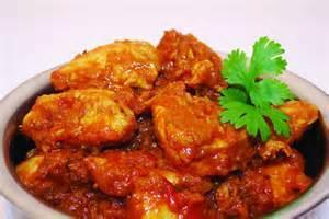 Chicken Curry · Boneless chicken pieces cooked in a mildly spiced curry sauce. Served with rice.