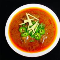 Chicken Nehari · Boneless beef shanks simmered in garlic, ginger, oil and other spices to a stew like consist...