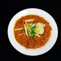 Chicken Qeema · Marinated ground chicken in a traditional medium spicy curry sauce.
