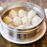 豬肉小籠包 Pork Xiao Long Bao · 10 pcs. Pork soup dumplings. *CONTAINS PEANUTS*