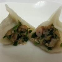 三鮮水餃 Three Flavored Dumplings · 10 pcs. Stuff with pork, shrimp, chives, and egg.