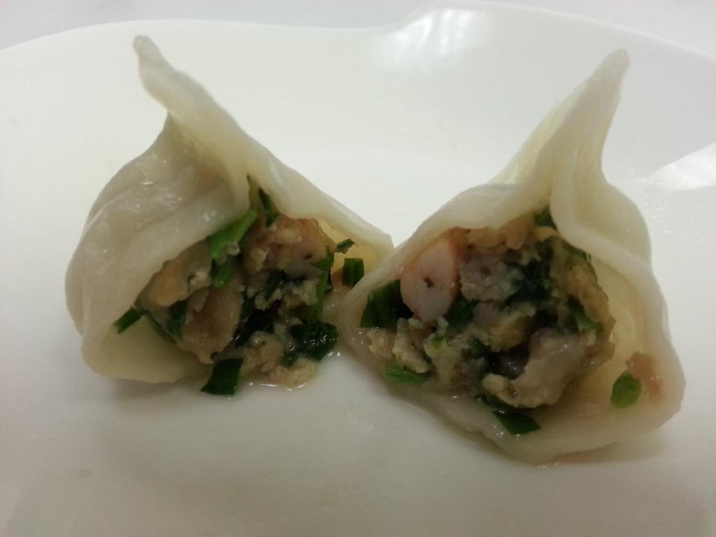 三鮮水餃 Three Flavored Dumplings · 10 pcs. Stuff with pork, shrimp, chives, and egg.