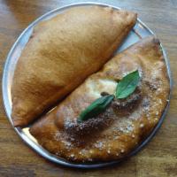 Slice-Arotti · Our house-made version of the inside-out: sauce and mozzarella deep-fried to crisp perfectio...