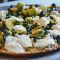 Brussels Sprouts Pizza · Brussels sprouts, bacon, mozzarella, provolone, and balsamic glaze.