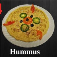 24. Hummus · Ground chickpeas with tahini sauce and lemons.