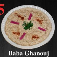 25. Baba Ghanouj · Ground eggplant with tahini sauce, lemons and garlic.