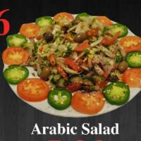 26. Arabic Salad · Romaine lettuce, tomatoes, cucumbers, olives, green peppers with house dressing.