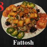 28. Fattoush · Crunchy pita bread mixed with chopped tomatoes, cucumbers and mint.