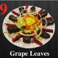29. Grape Leaves · Grape leaves stuffed with rice and meat.