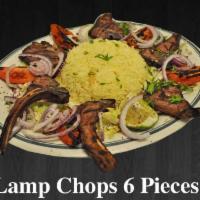 8. Lamp Chops · 6 pieces of lamp chops served with bread, soup, and 2 appetizers.