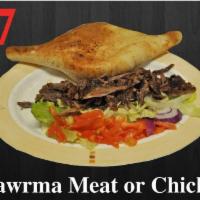 17.b Chicken Shawrma Sandwich · Marinated layers tender chicken grilled and wrapped in pita with tomatoes, pickles and tahin...