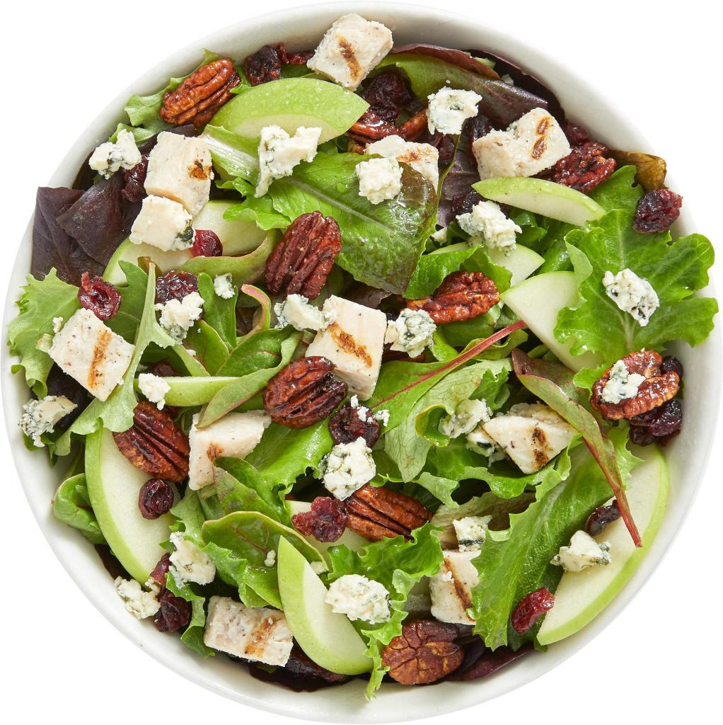 Sophie's Salad · 310 calories. Spring mix, chicken, green apples, dried cranberries, honey roasted pecans, blue cheese crumbles. Recommended dressing: lite raspberry vinaigrette. Dressing served on the side only.