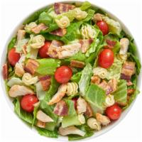 Turkey Club Salad · 290 calories. Romaine and Iceberg blend, radiatore pasta, roasted turkey, bacon pieces, toma...