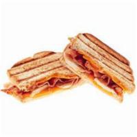 Turkey Melt Panini · 1020 calories. Roasted turkey, bacon, Cheddar cheese, and rustic Thousand Island dressing. S...