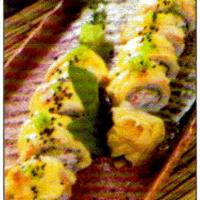 99. Baked Salmon Roll · Baked. Inside: crab meat, cucumber, and avocado. Outside: baked salmon with eel sauce.