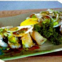118. Albacore with Sweet Onion Roll · Inside: spicy tuna. Outside: albacore and avocado onion with special white sauce and eel sau...