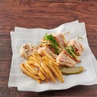 Turkey Club · Comes with bacon, lettuce and tomatoes. Served with french fries, coleslaw and mayonnaise.