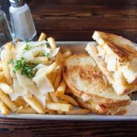 Butter Poached Lobster Grilled Cheese · Butter poached lobster tail, caramelized onions and tomatoes, Jack and cheddar cheeses, sour...