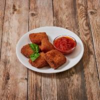 Fried Mozzarella · Fresh mozzarella wedges breaded and pan seared to a golden brown. Served with marinara sauce.