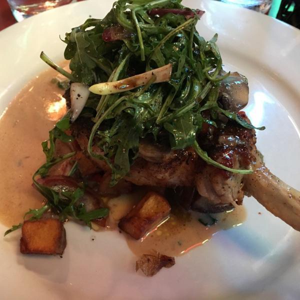 Blackened Pork Chop Plate · 8 oz. center cut chop seasoned and grilled to perfection, topped with a mushroom gravy, served on a bed of home fries and garnished with arugula salad.