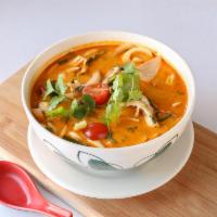 13. Tom Kah · Spicy coconut milk soup with galanga root, kaffir leaves, lemongrass, tomatoes, onions, mush...