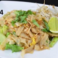 24. Khou Kai · Wide side noodles fried with chicken, egg, lettuce, black pepper and green onions, topped wi...