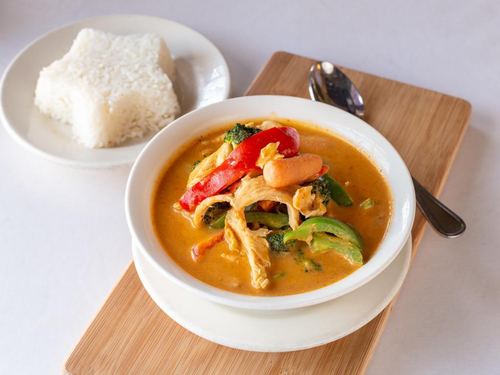 30. House Special Curry · With choice of meat, red curry peanut sauce with bell pepper, carrots and broccoli. Served with jasmine rice.