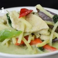 31. Green Curry · Choice of meat, eggplants, bamboo shoots, bell peppers, coconut milk and basil leaves in a T...