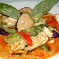 33. Red Curry · Choice of meat, oriental eggplants, bamboo shoots, bell peppers and basil leaves in Thai red...