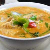 35. Pa Nang Curry · Choice of meat, kaffir leaves, basil leaves, green bean, bell pepper cooked with coconut mil...