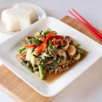 38. Stir Fried Spicy Sweet Basil · Stir-fried choice of meat with fresh chili, fresh garlic, bell peppers, onions, mushrooms, g...