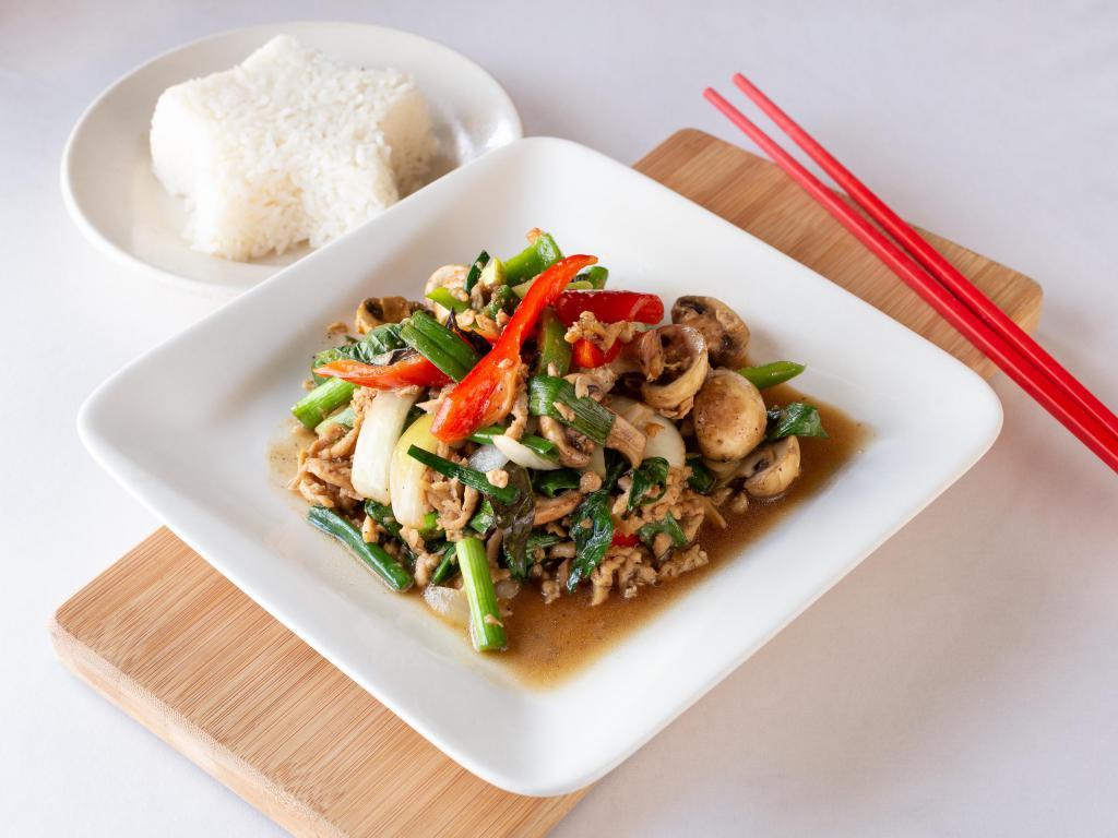 38. Stir Fried Spicy Sweet Basil · Stir-fried choice of meat with fresh chili, fresh garlic, bell peppers, onions, mushrooms, green onions, black pepper and sweet basil. Ground chicken recommended.